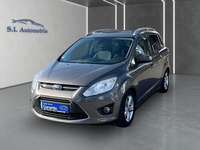 Brisbane braun (met.) Gebraucht 2013 Ford Grand C-Max SYNC Edition Van / Kleinbus | 7.890 € (Etwas zu teuer) - Bild 1/4