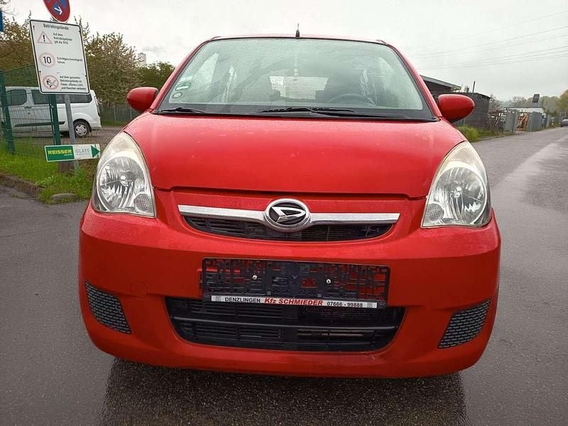 Gebraucht Daihatsu Cuore 58 PS (42 kW) 2011 Rot Kleinwagen