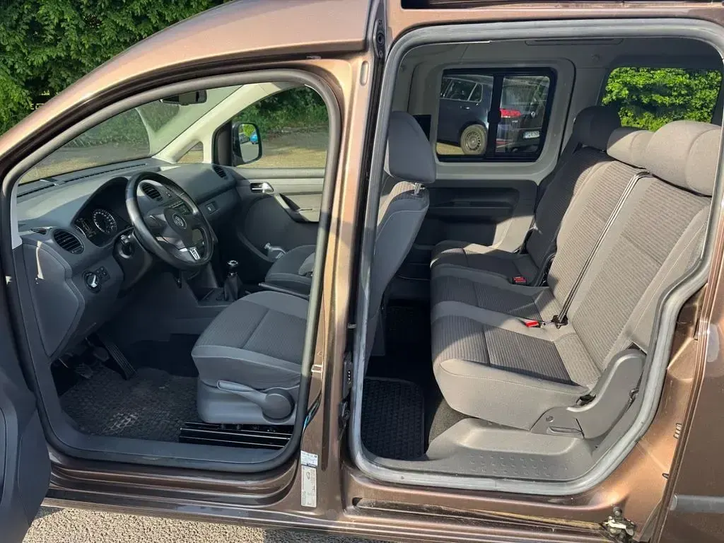 Używany VW Caddy Comfortline 105 KM (77 kW) 2011 Brązowy Minivan