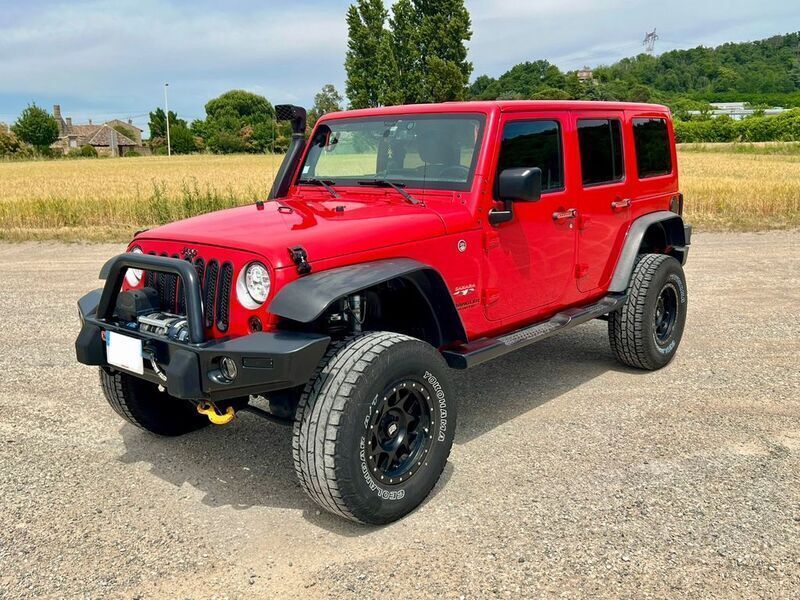 Rot Gebraucht 2016 Jeep Wrangler Sahara SUV | 45.000 € - Bild 1/4
