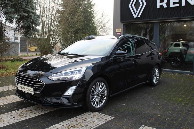 Gebraucht Ford Focus Titanium 125 PS (91 kW) 2019 Iridiumschwarz Kombi