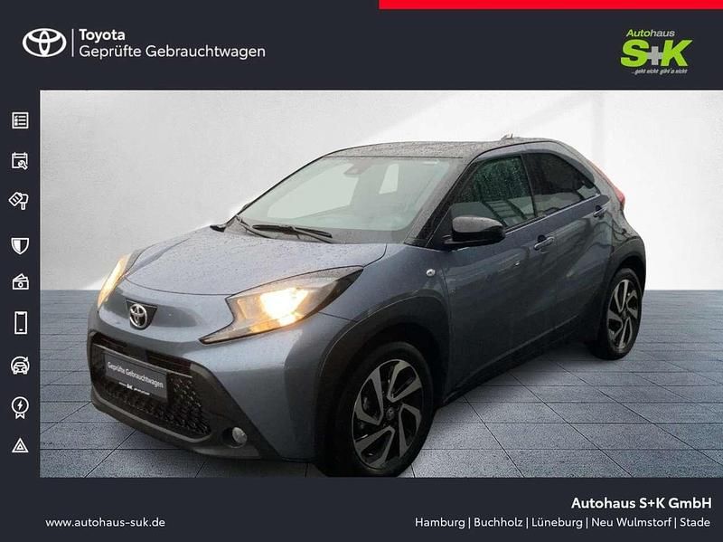 Grau Gebraucht 2025 Toyota Aygo X SUV | 15.979 € (Fairer Preis) - Bild 1/4