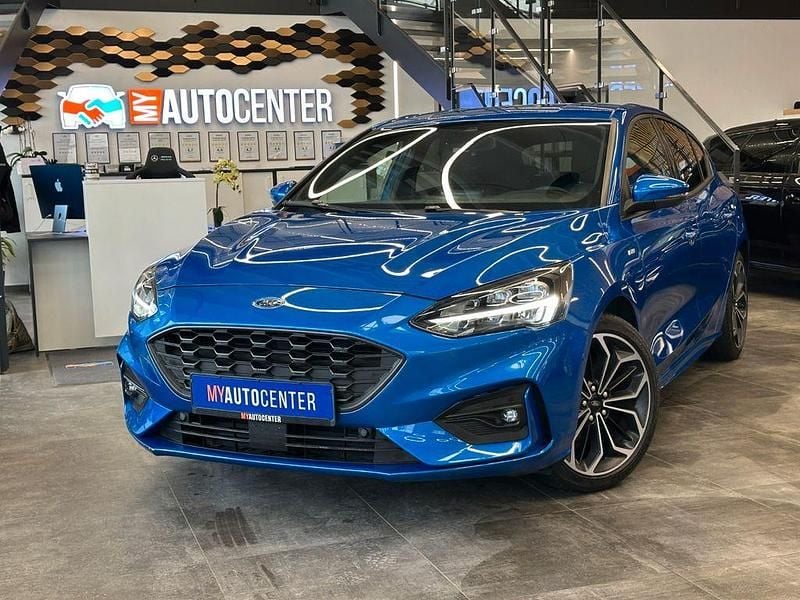 Blau Gebraucht 2019 Ford Focus ST-Line Limousine | 17.199 € (Fairer Preis) - Bild 1/4