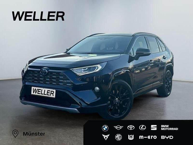 240) nagoyablau metallic / dach schwarz (schwarz Gebraucht 2020 Toyota RAV4 Hybrid Style SUV | 32.990 € (Fairer Preis) - Bild 1/3