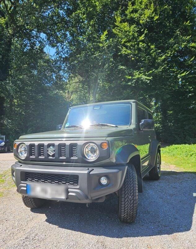 Grün Gebraucht 2018 Suzuki Jimny Comfort SUV | 28.500 € (Fairer Preis) - Bild 1/4
