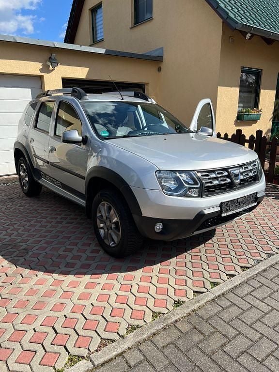 Second-hand Dacia Duster 125 CP (91 kW) 2014 Argintiu SUV