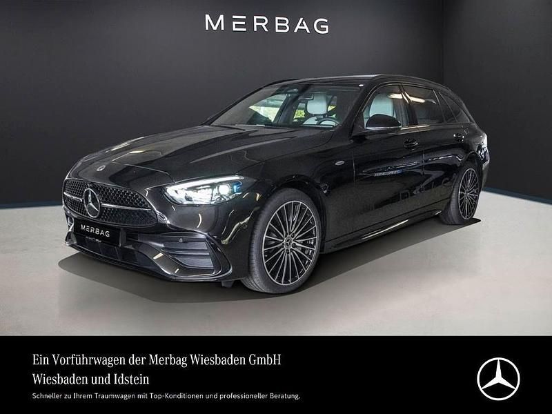 Obsidianschwarz Gebraucht 2025 Mercedes C300e AMG Kombi | 59.890 € - Bild 1/4