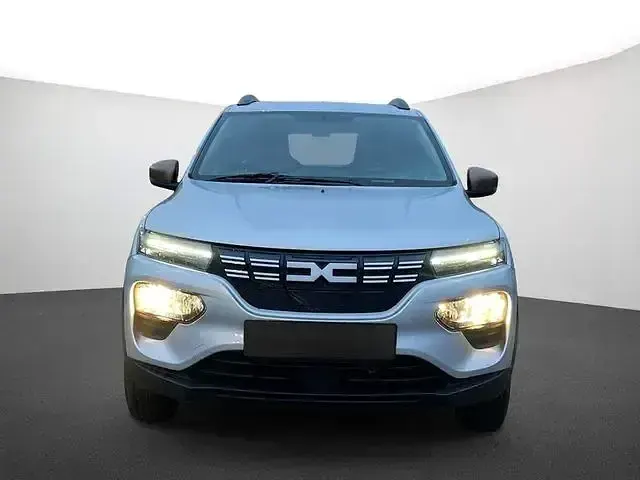 Gebraucht Dacia Spring Extreme 47 kW (65 PS) 2023 Diamantsilbergrau Kleinwagen