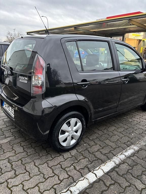 Gebraucht Daihatsu Sirion 69 PS (50 kW) 2009 Schwarz Kleinwagen