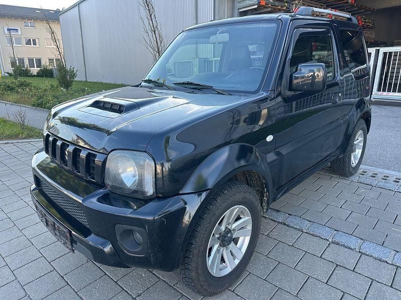 Schwarz Gebraucht 2012 Suzuki Jimny Style SUV | 7.999 € (Superpreis) - Bild 1/4