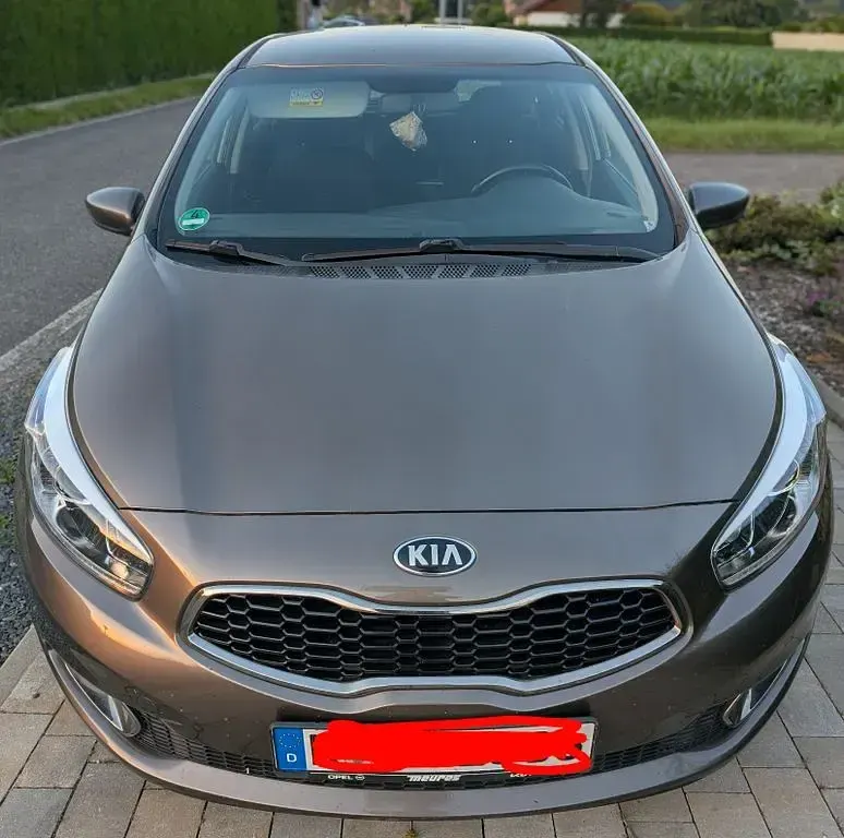 Gebraucht Kia Ceed 110 PS (80 kW) 2014 Braun Kleinwagen