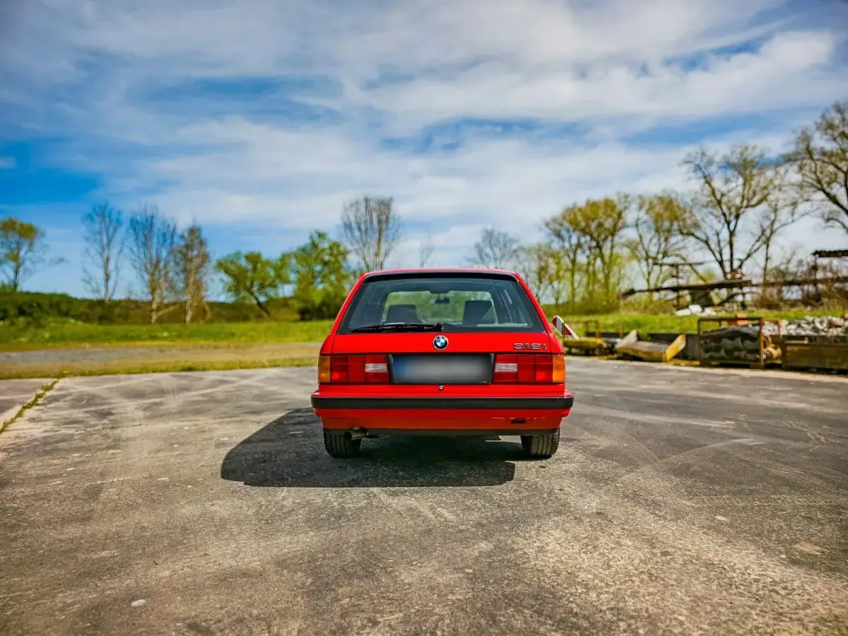 Gebraucht BMW 318 154 PS (113 kW) 1990 Rot Kombi