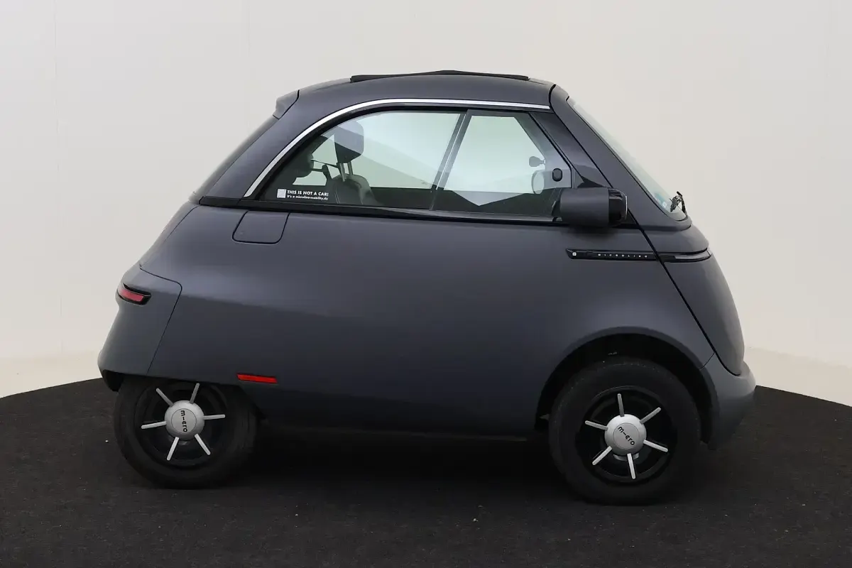 Gebraucht Micro Microlino 13 kW (18 PS) 2024 Schwarz (berlin anthrazit matt) Kleinwagen