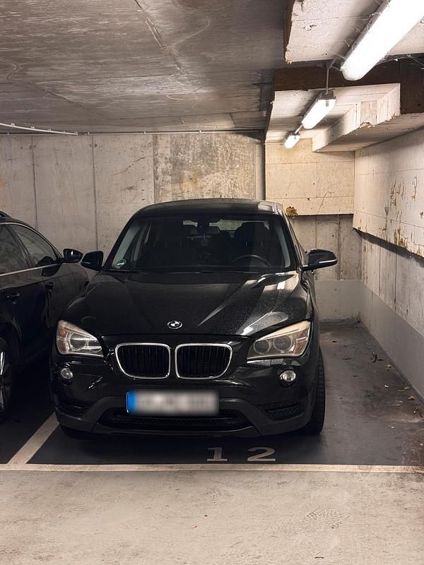 Schwarz Gebraucht 2012 BMW X1 Comfort Edition SUV | 10.499 € - Bild 1/4