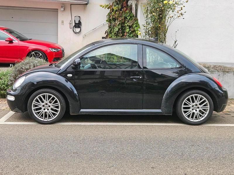Gebraucht VW New Beetle 115 PS (84 kW) 2000 Schwarz Kleinwagen