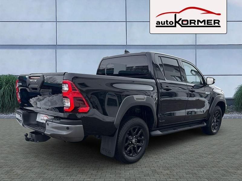 Gebraucht Toyota HiLux 204 PS (150 kW) 2025 Tiefschwarz metallic Pickup
