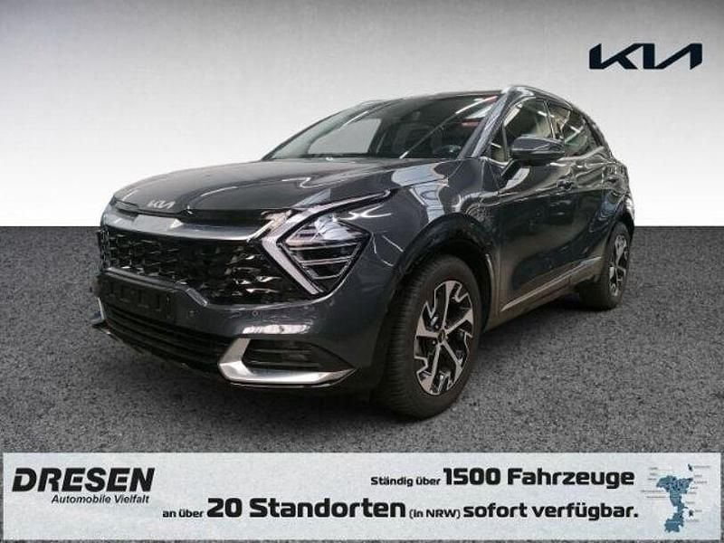 H8g) pentametal met. (grau Gebraucht 2025 Kia Sportage Spirit SUV | 32.890 € (Guter Preis) - Bild 1/4