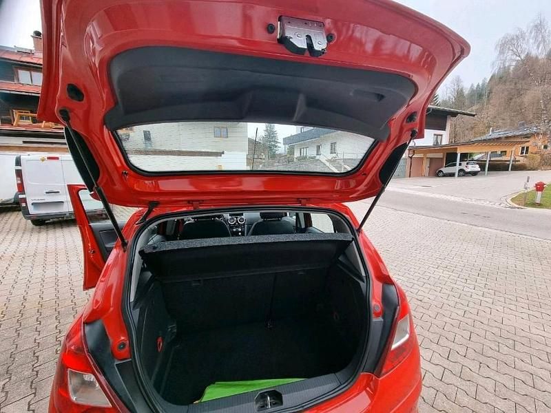 Gebraucht Opel Corsa 87 PS (63 kW) 2013 Rot Kleinwagen