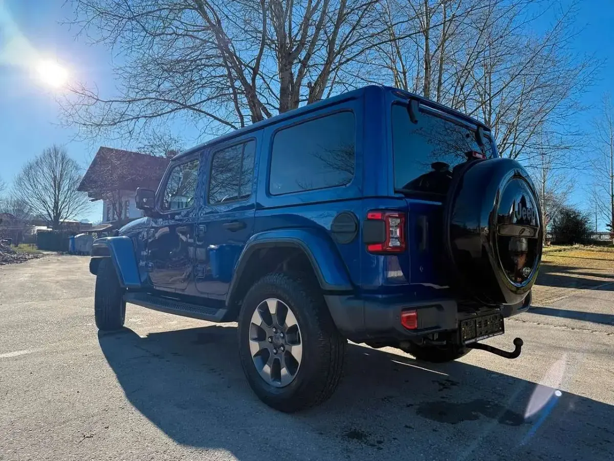 Gebraucht Jeep Wrangler Unlimited Sahara 200 PS (147 kW) 2019 Ocean blue metallic SUV
