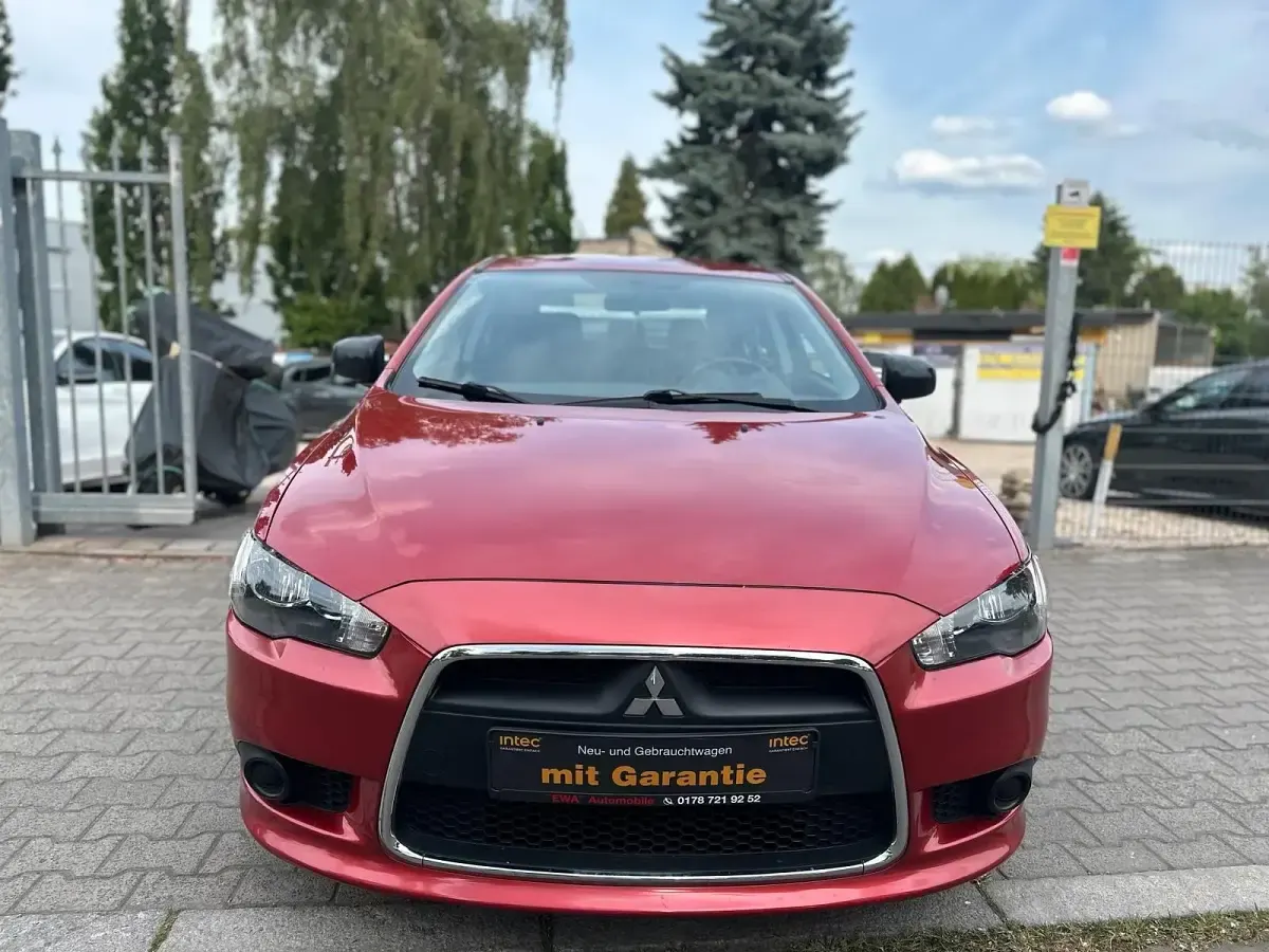 Gebraucht Mitsubishi Lancer 117 PS (86 kW) 2015 Rot Limousine