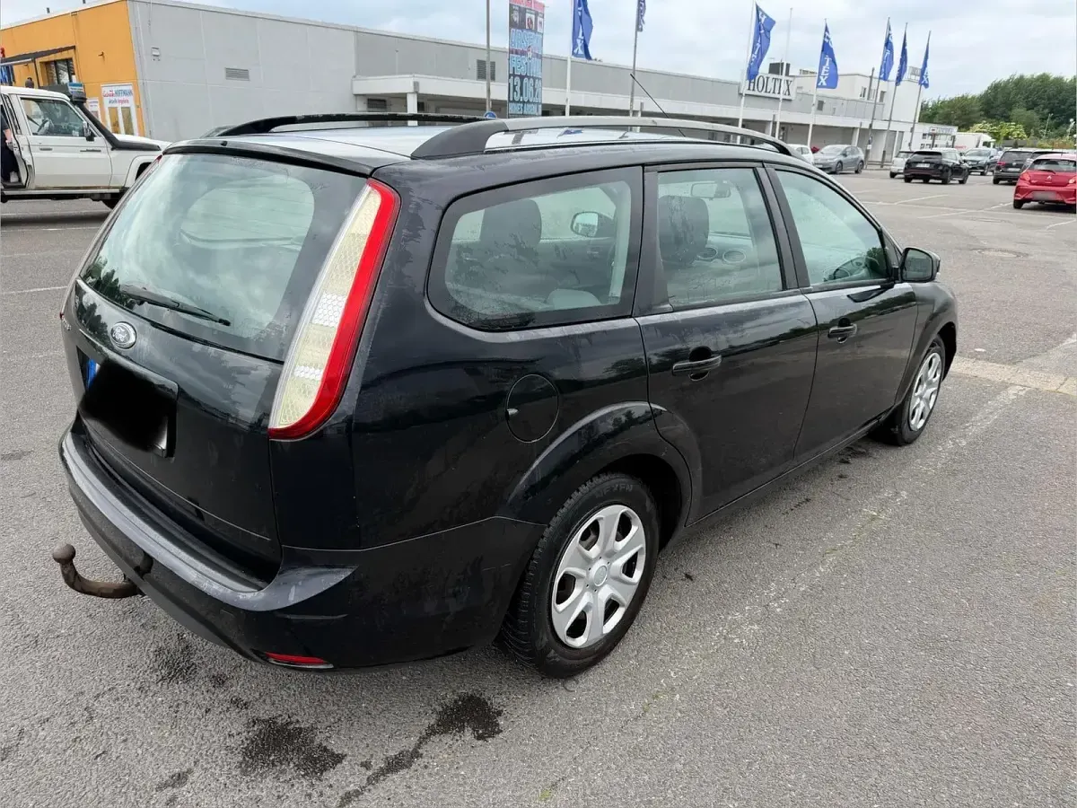 Gebraucht Ford Focus 101 PS (74 kW) 2011 Schwarz Kombi
