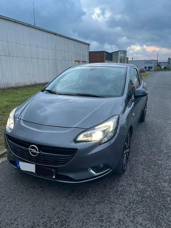 Grau Gebraucht 2015 Opel Corsa Edition Kleinwagen | 5.500 € (Fairer Preis) - Bild 1/4