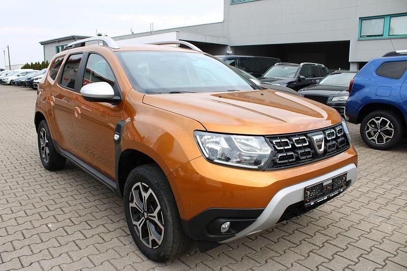 Używany Dacia Duster 116 KM (85 kW) 2021 Pomarańczowy SUV