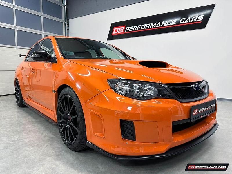 Orange Gebraucht 2013 Subaru Impreza Limousine | 51.990 € - Bild 1/4