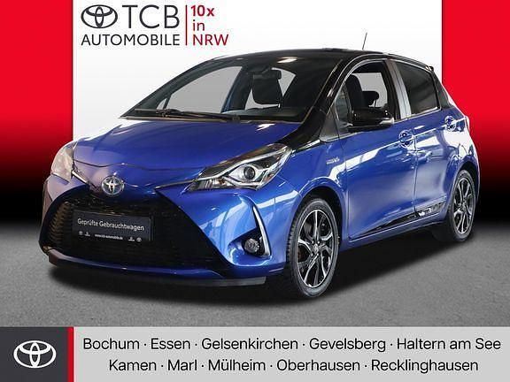 Titanblau metallic / mysticschwarz mica Gebraucht 2017 Toyota Yaris Hybrid Plus Kleinwagen | 13.979 € (Fairer Preis) - Bild 1/4