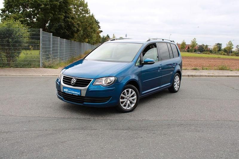 Blau Gebraucht 2009 VW Touran Freestyle Van / Kleinbus | 5.450 € (Fairer Preis) - Bild 1/4