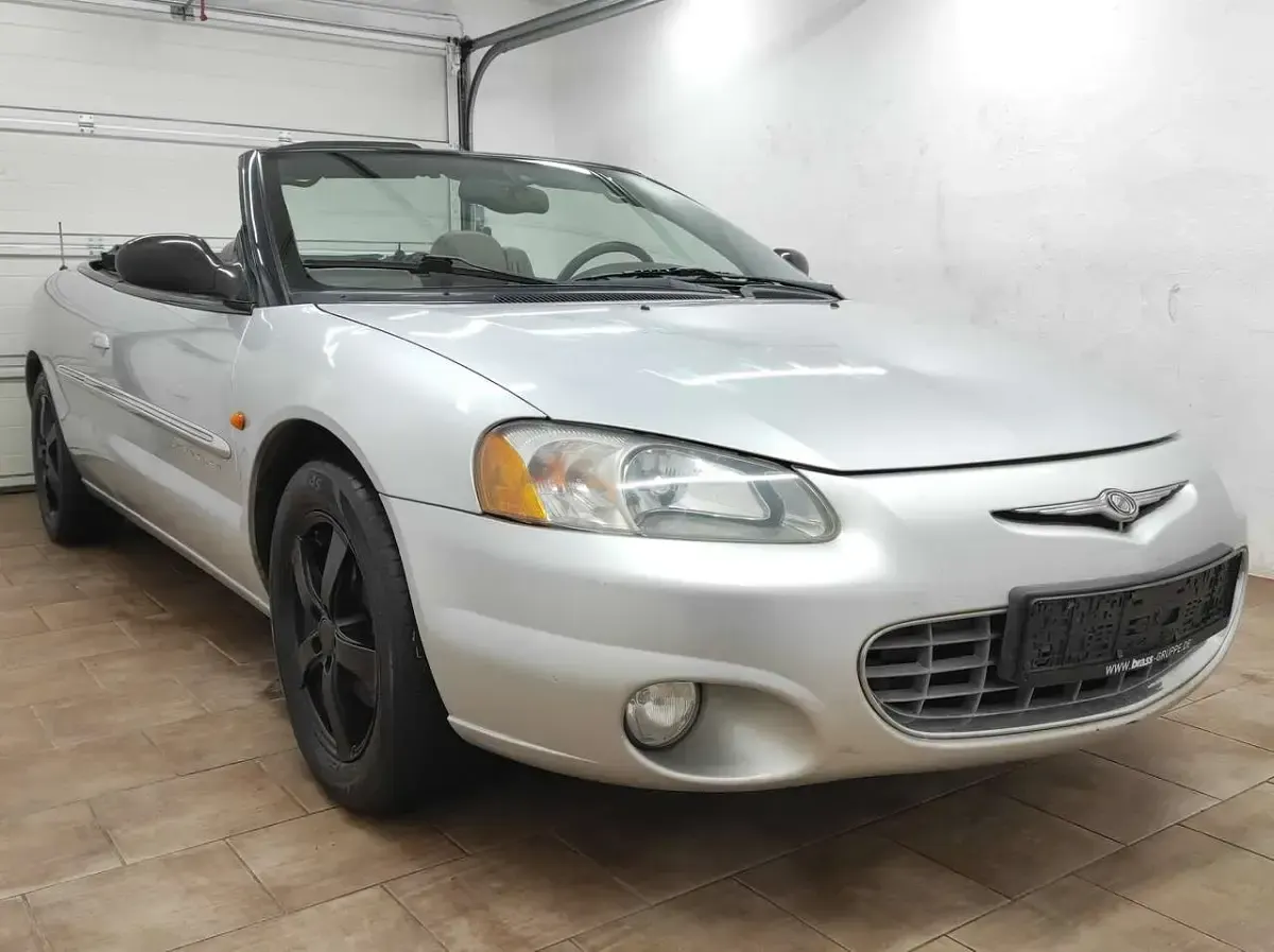 Second-hand Chrysler Sebring Cabriolet 203 CP (149 kW) 2001 Argintiu Cabrio