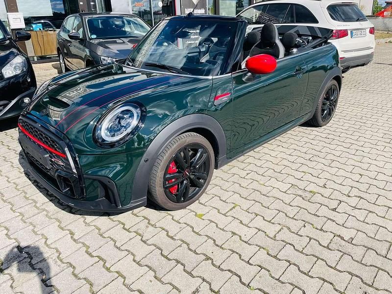 Rebel green uni Gebraucht 2023 Mini John Cooper Works Cabriolet Cabrio | 35.990 € (Fairer Preis) - Bild 1/4