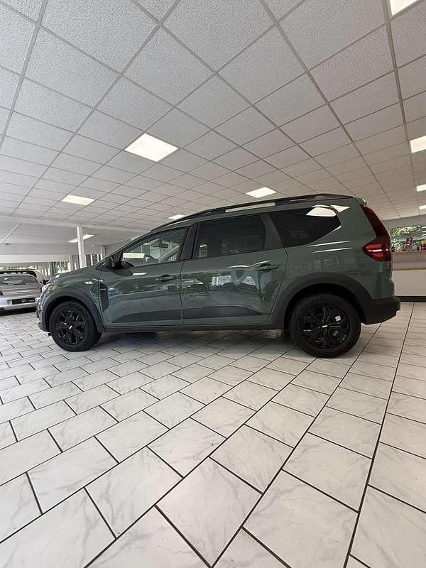 Schiefergrau Gebraucht 2023 Dacia Jogger Extreme Van / Kleinbus | 18.500 € (Guter Preis) - Bild 1/4