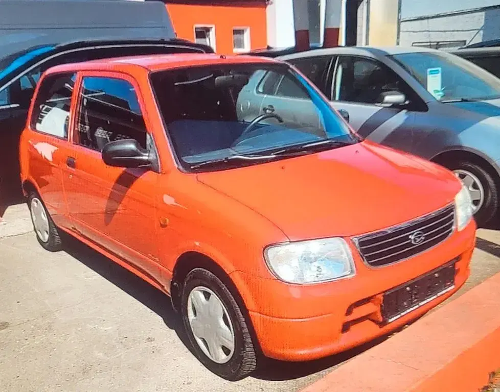 Brugt Daihatsu Cuore Plus 56 HK (41 kW) 2003 Rød Hatchback