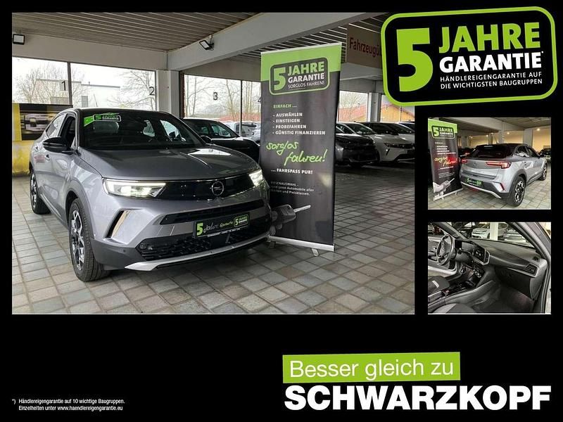 Gebraucht Opel Mokka-e Ultimate 100 kW (136 PS) 2022 Kontrast grau/quarz silber SUV
