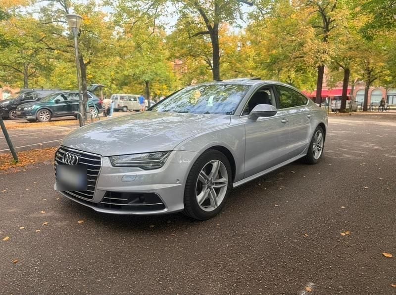 Grau Gebraucht 2017 Audi A7 Ambition Limousine | 14.900 € (Fairer Preis) - Bild 1/4