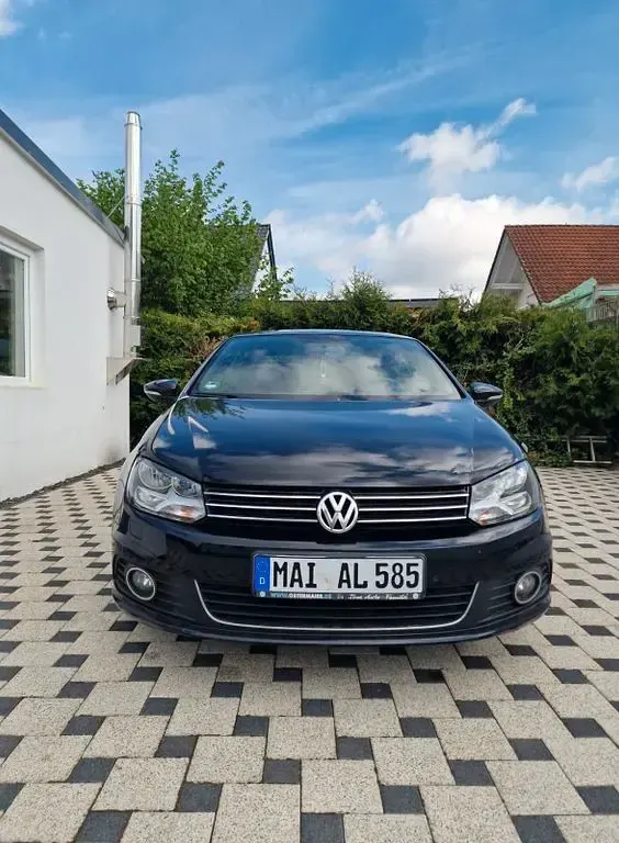 Używany VW Eos Exclusive 140 KM (102 kW) 2011 Czarny Kabriolet