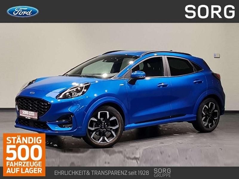Desert island blue metallic Gebraucht 2021 Ford Puma Gen-E ST-Line X SUV | 19.990 € - Bild 1/4