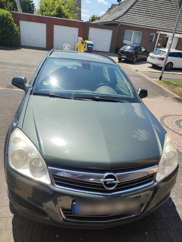 Grün Gebraucht 2009 Opel Astra Kombi | 2.199 € (Fairer Preis) - Bild 1/4