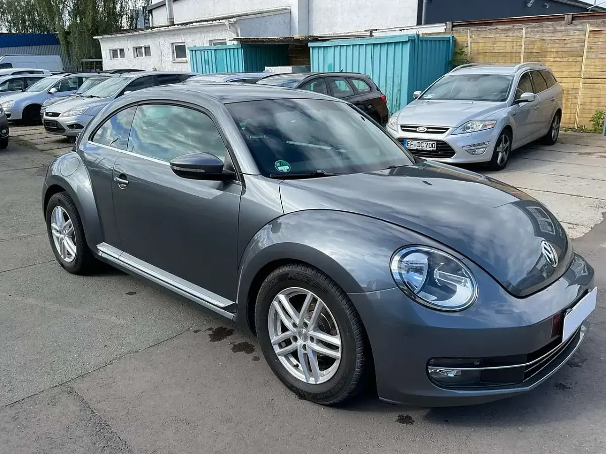 Gebraucht VW Beetle Design 105 PS (77 kW) 2012 Platinum grey metallic Kleinwagen
