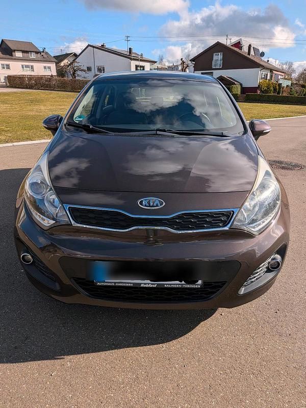 Gebraucht Kia Rio 109 PS (80 kW) 2012 Braun Kleinwagen