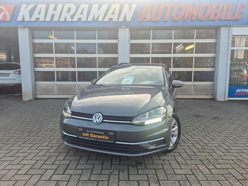 Indiumgrau metallic Gebraucht 2018 VW Golf VII Comfortline Kombi | 13.999 € (Fairer Preis) - Bild 1/4