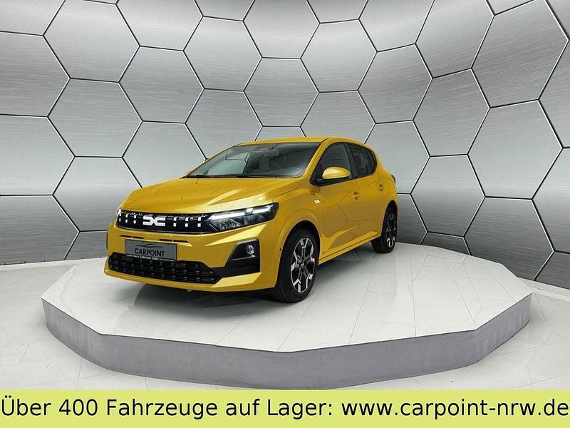 Gelb Neu 2025 Dacia Sandero Journey Limousine | 18.190 € - Bild 1/4