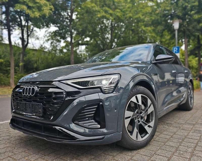 Magnetgrau Gebraucht 2023 Audi Q8 e-tron Sport SUV | 49.444 € (Guter Preis) - Bild 1/4