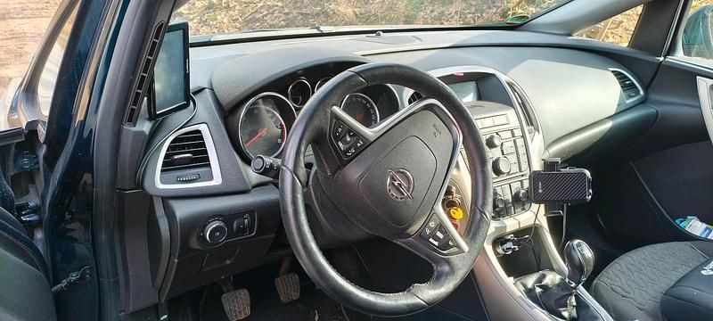 Gebraucht Opel Astra 130 PS (95 kW) 2013 Grün Kombi