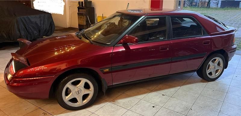 Second-hand Mazda 323F 88 CP (64 kW) 1994 Roșu Hatchback