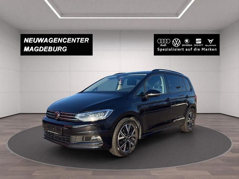 Schwarz Gebraucht 2024 VW Touran Comfortline Van / Kleinbus | 36.980 € (Etwas zu teuer) - Bild 1/4