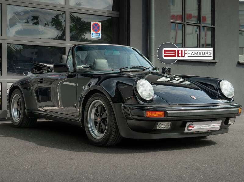 Uni schwarz a1 Gebraucht 1989 Porsche 911 Cabrio | 99.900 € - Bild 1/4