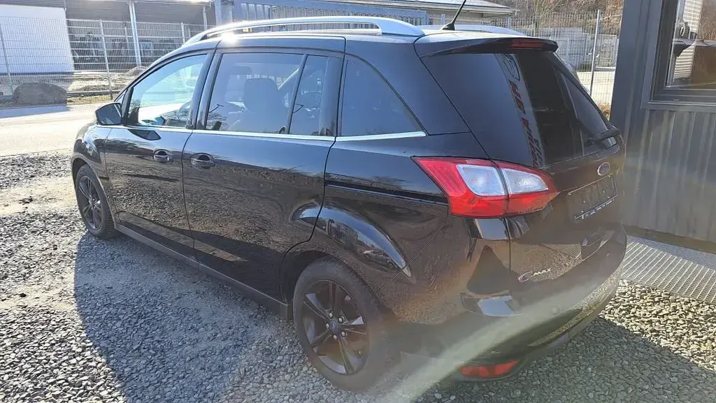 Gebraucht Ford Grand C-Max Champions Edition 125 PS (91 kW) 2012 Schwarz Van / Kleinbus
