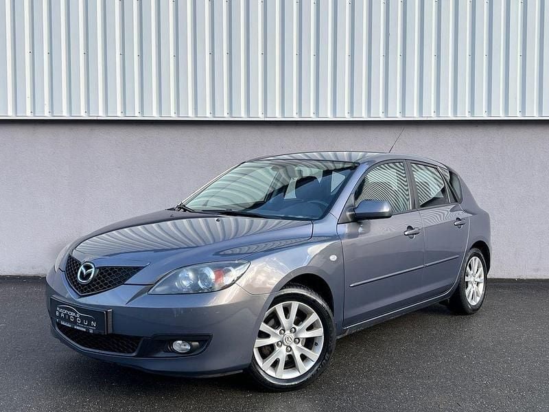 Grau Gebraucht 2007 Mazda 3 Active Limousine | 2.490 € (Etwas zu teuer) - Bild 1/4
